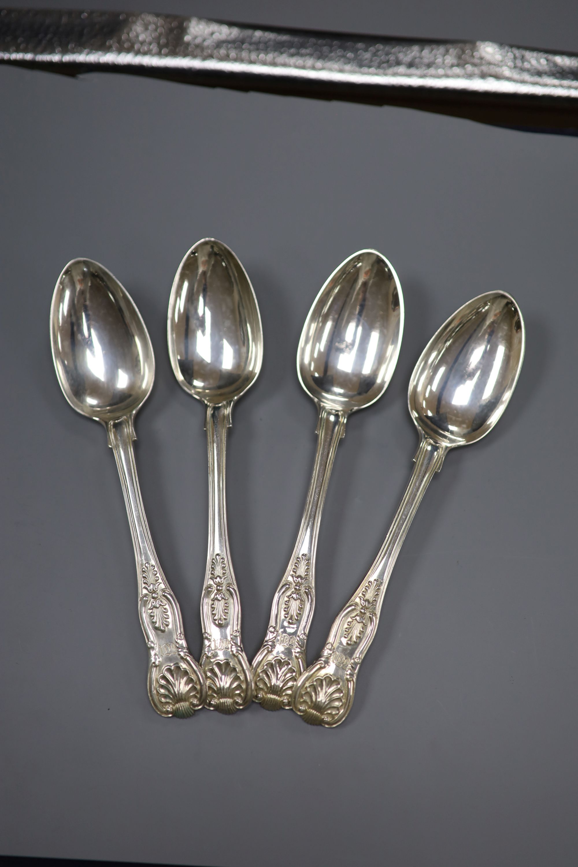 A set of four William IV silver Kings pattern dessert spoons, William Chawner II, London, 1830, 7.8oz.